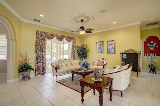 living room featuring light tile patterned flooring, ceiling fan, and crown molding