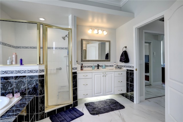 bathroom with independent shower and bath, vanity, and ornamental molding