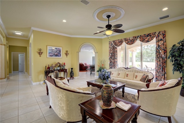 tiled living room featuring ceiling fan and crown molding