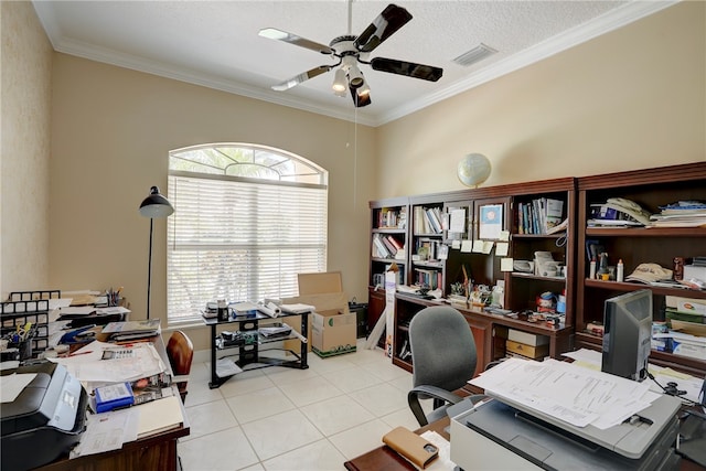 office space with ceiling fan, a textured ceiling, light tile patterned floors, and ornamental molding