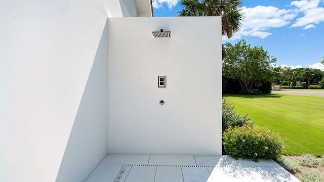 985 Clipper Rd, Vero Beach, FL 32963 - view of storm shelter with a lawn