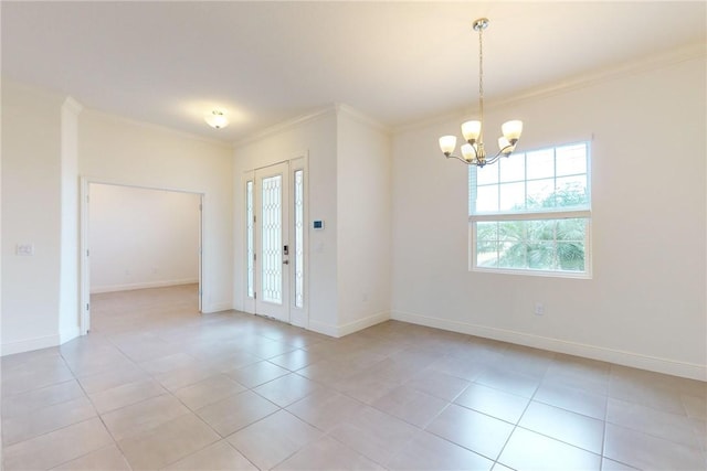 2545 Saint Lucia Cir, Vero Beach, FL 32967 - spare room featuring ornamental molding, a chandelier, light tile patterned flooring, and baseboards