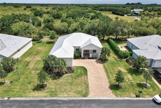 2545 Saint Lucia Cir, Vero Beach, FL 32967 - view of subject property with a forest