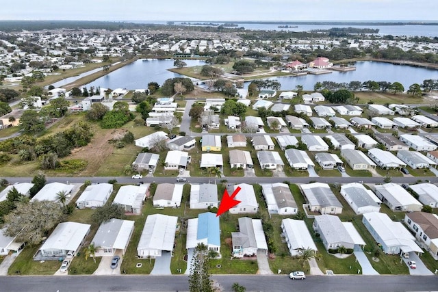 bird's eye view with a water view