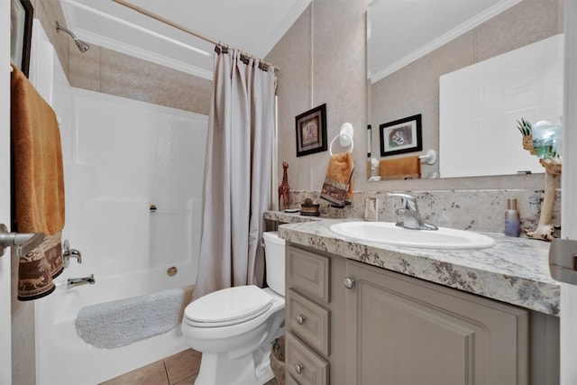 full bathroom with tile patterned floors, ornamental molding, vanity, shower / tub combo with curtain, and toilet