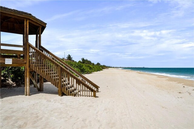 water view featuring a beach view