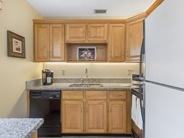 2800 Indian River Blvd Unit S5, Vero Beach, FL 32960 - kitchen featuring freestanding refrigerator, dishwasher, a sink, stone countertops, and stove