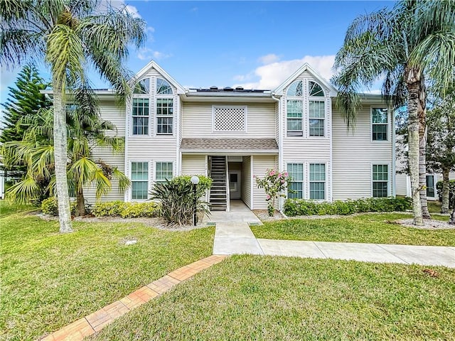 view of property with a front yard