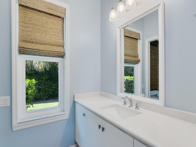 bathroom featuring vanity and a wealth of natural light