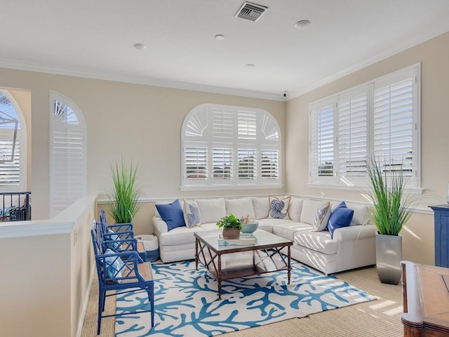 carpeted living room with crown molding