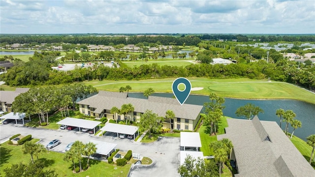 28 Plantation Dr Unit 204, Vero Beach, FL 32966 - aerial perspective of suburban area with a local golf course, a large body of water, and a tree filled landscape