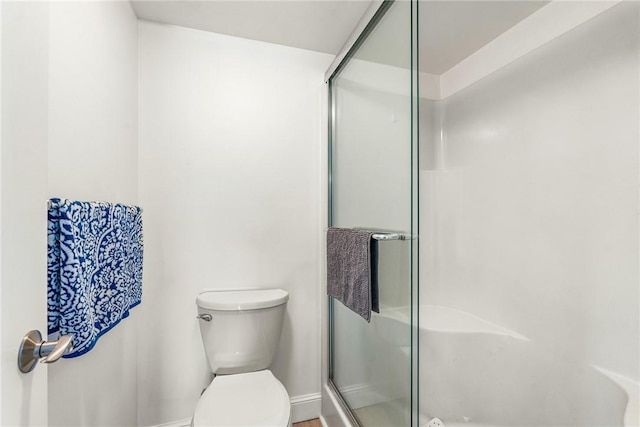 28 Plantation Dr Unit 204, Vero Beach, FL 32966 - full bath featuring toilet, a stall shower, and baseboards