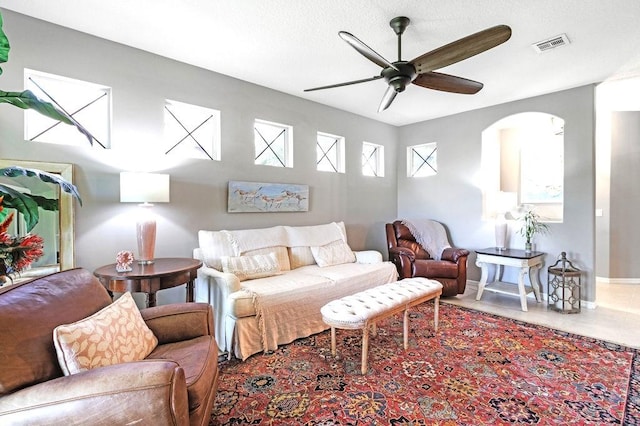 living room with ceiling fan