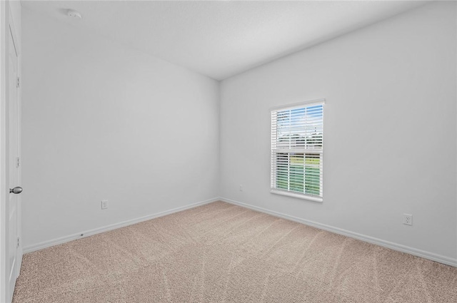 8715 98th Ct, Vero Beach, FL 32967 - empty room featuring carpet and baseboards