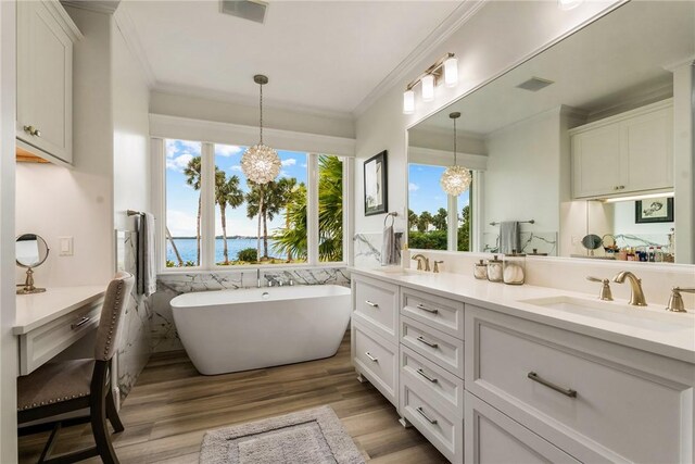 1411 E Camino Del Rio, Vero Beach, FL 32963 - full bathroom with a sink, crown molding, a notable chandelier, and visible vents