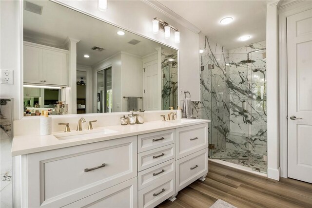 1411 E Camino Del Rio, Vero Beach, FL 32963 - full bath featuring double vanity, a marble finish shower, ornamental molding, and a sink