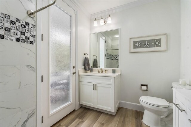 1411 E Camino Del Rio, Vero Beach, FL 32963 - full bathroom with toilet, wood finished floors, vanity, ornamental molding, and a marble finish shower