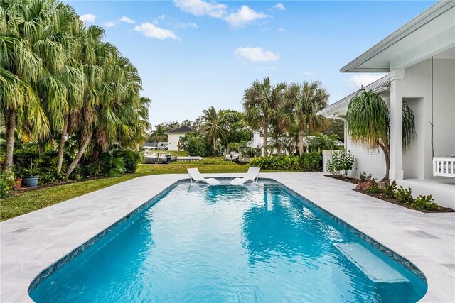 1411 E Camino Del Rio, Vero Beach, FL 32963 - pool featuring a patio