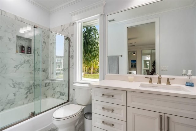 1411 E Camino Del Rio, Vero Beach, FL 32963 - bathroom with toilet, vanity, visible vents, crown molding, and bath / shower combo with glass door