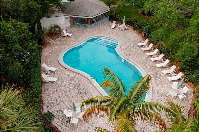 view of pool featuring a patio area