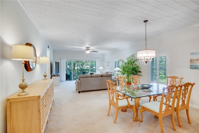 107 W Park Shores Cir Unit 28W, Vero Beach, FL 32963 - dining room featuring light colored carpet, a chandelier, crown molding, a ceiling fan, and wood ceiling