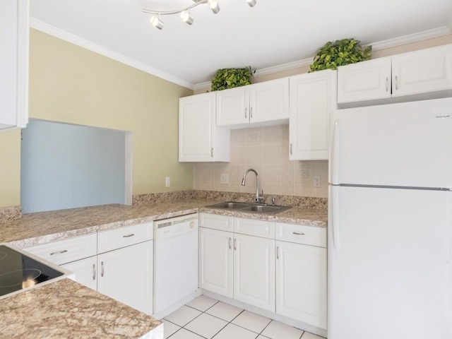 kitchen featuring sink, ornamental molding, white appliances, decorative backsplash, and white cabinets