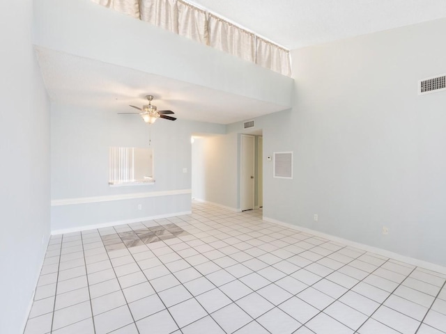 unfurnished room with ceiling fan