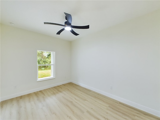 spare room with ceiling fan and light hardwood / wood-style floors