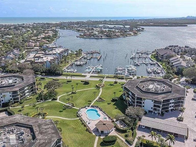 birds eye view of property featuring a water view