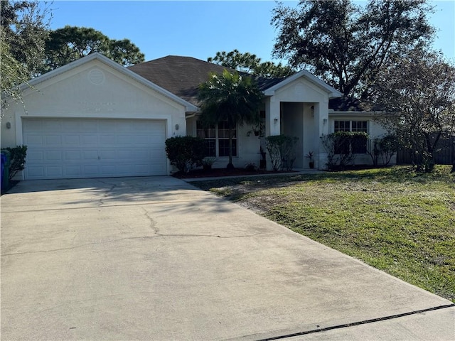 ranch-style home with a garage, driveway, a front lawn, and stucco siding