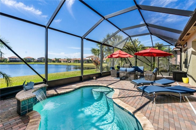 pool featuring a water view, a lanai, and a patio area