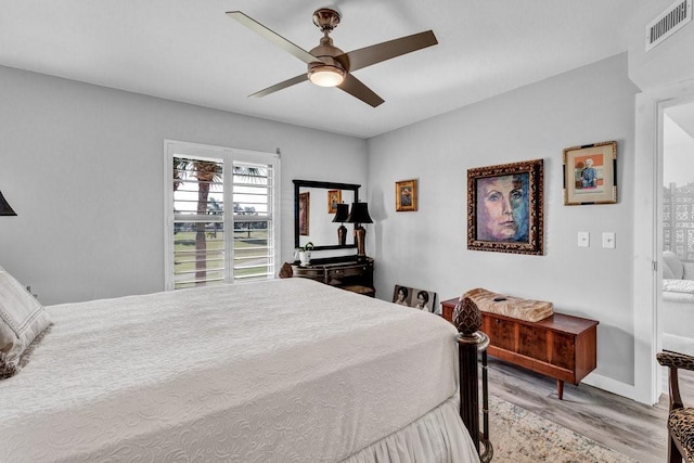 bedroom featuring ceiling fan and light wood-type flooring