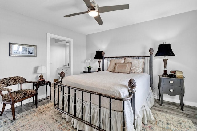 bedroom with hardwood / wood-style floors and ceiling fan