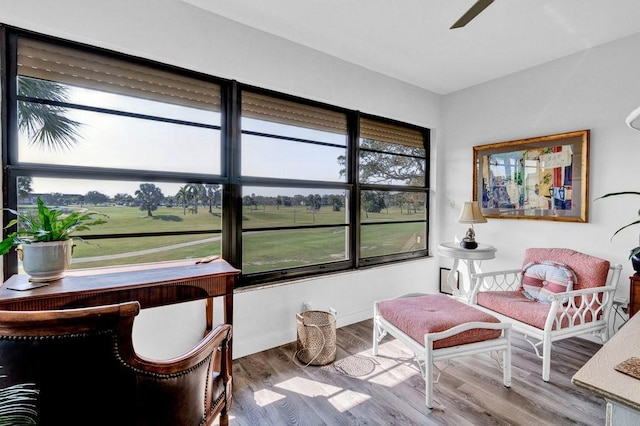 sunroom / solarium with ceiling fan