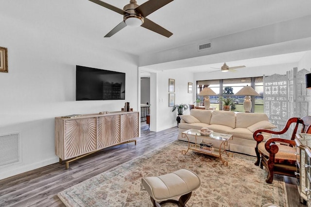 living room featuring hardwood / wood-style flooring and ceiling fan