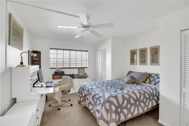 bedroom with carpet and a ceiling fan