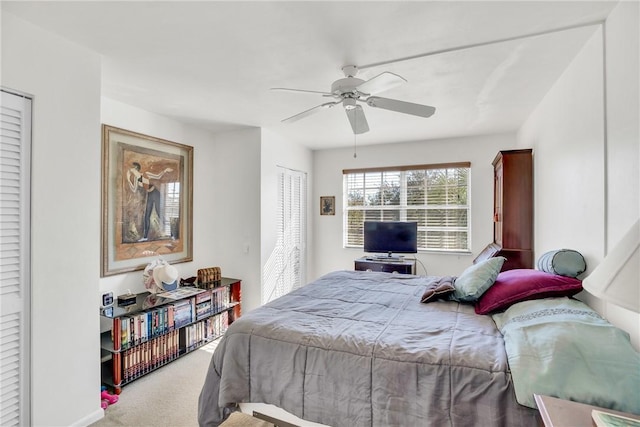 carpeted bedroom featuring ceiling fan