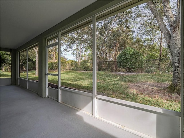 unfurnished sunroom with plenty of natural light