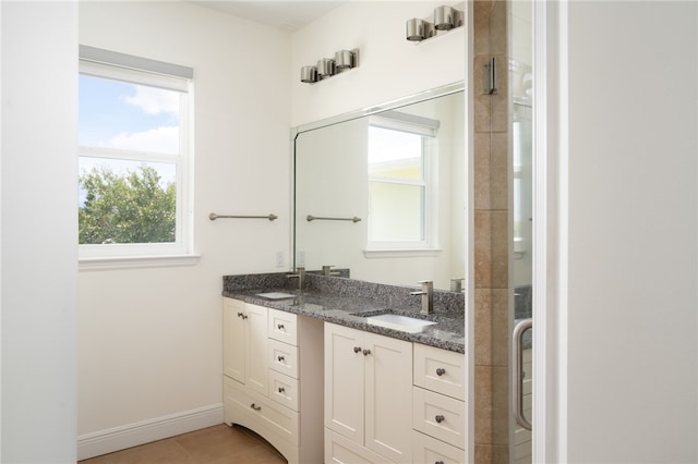 6225 S US Highway 1, Grant Valkaria, FL 32949 - full bath featuring double vanity, tile patterned floors, and a shower with door