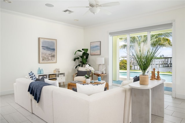 6225 S US Highway 1, Grant Valkaria, FL 32949 - living room with ornamental molding, ceiling fan, and light tile patterned floors