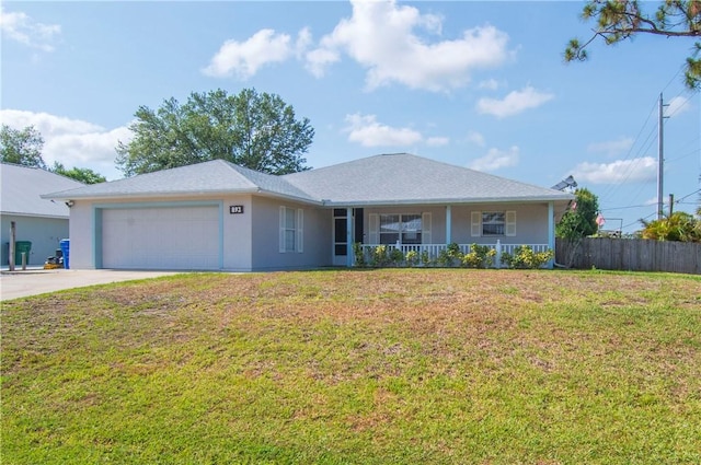 892 Majestic Ave, Sebastian, FL 32958 - ranch-style house with an attached garage, a porch, concrete driveway, and stucco siding