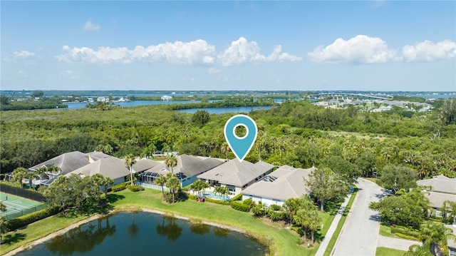 birds eye view of property featuring a water view