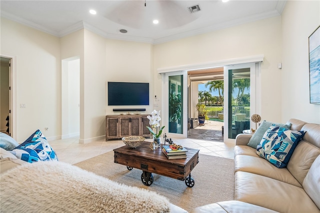 living area featuring visible vents, crown molding, and light tile patterned flooring