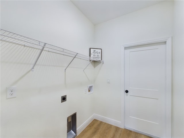 laundry room featuring washer hookup, electric dryer hookup, and hardwood / wood-style floors