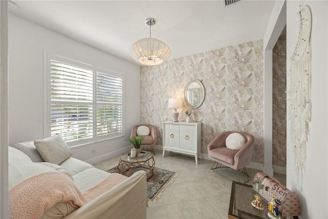 living area with an inviting chandelier