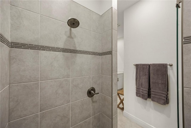 bathroom with tiled shower