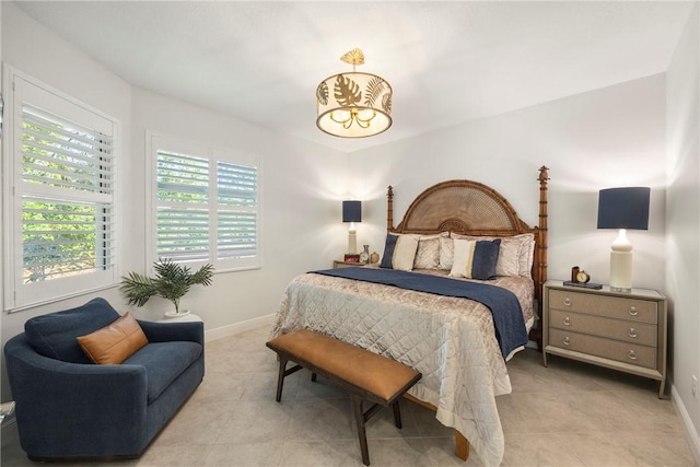 bedroom with a chandelier