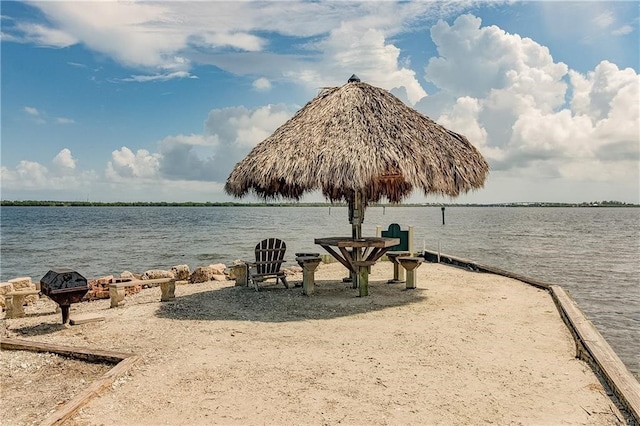 water view with an outdoor fire pit