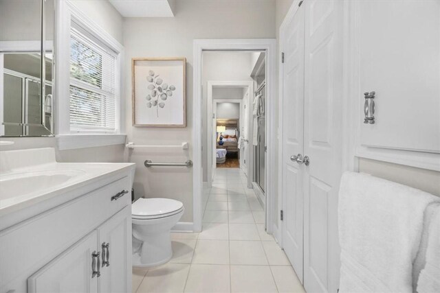 449 S Garcon Point Rd Fl, Milton, FL 32583 - bathroom with vanity, tile patterned flooring, and an enclosed shower