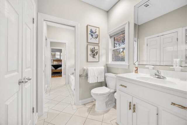 449 S Garcon Point Rd Fl, Milton, FL 32583 - bathroom with vanity, healthy amount of natural light, and tile patterned floors